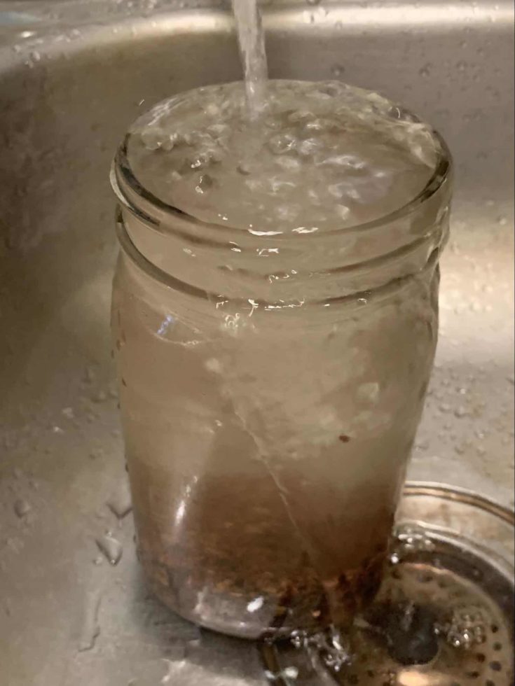 Water overflowing on the jar.